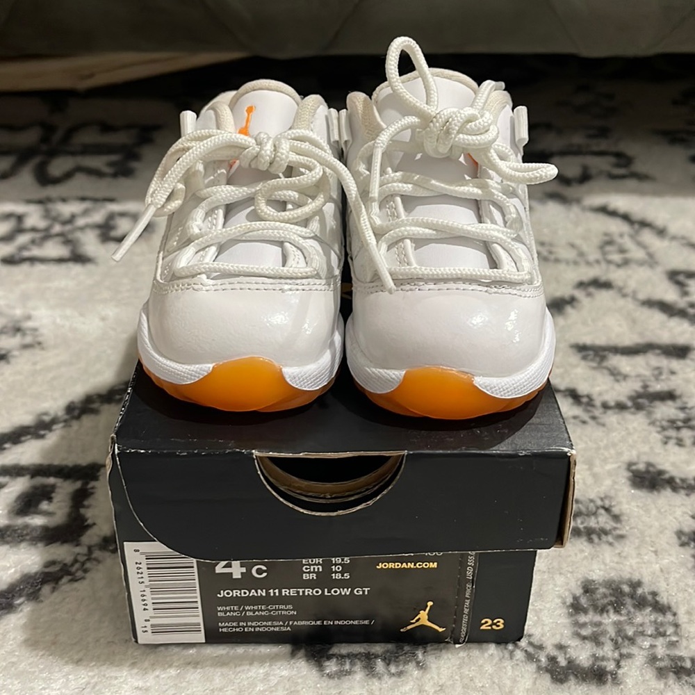Baby boys Jordan 11 retro low gt white/citrus size 4c- never worn.